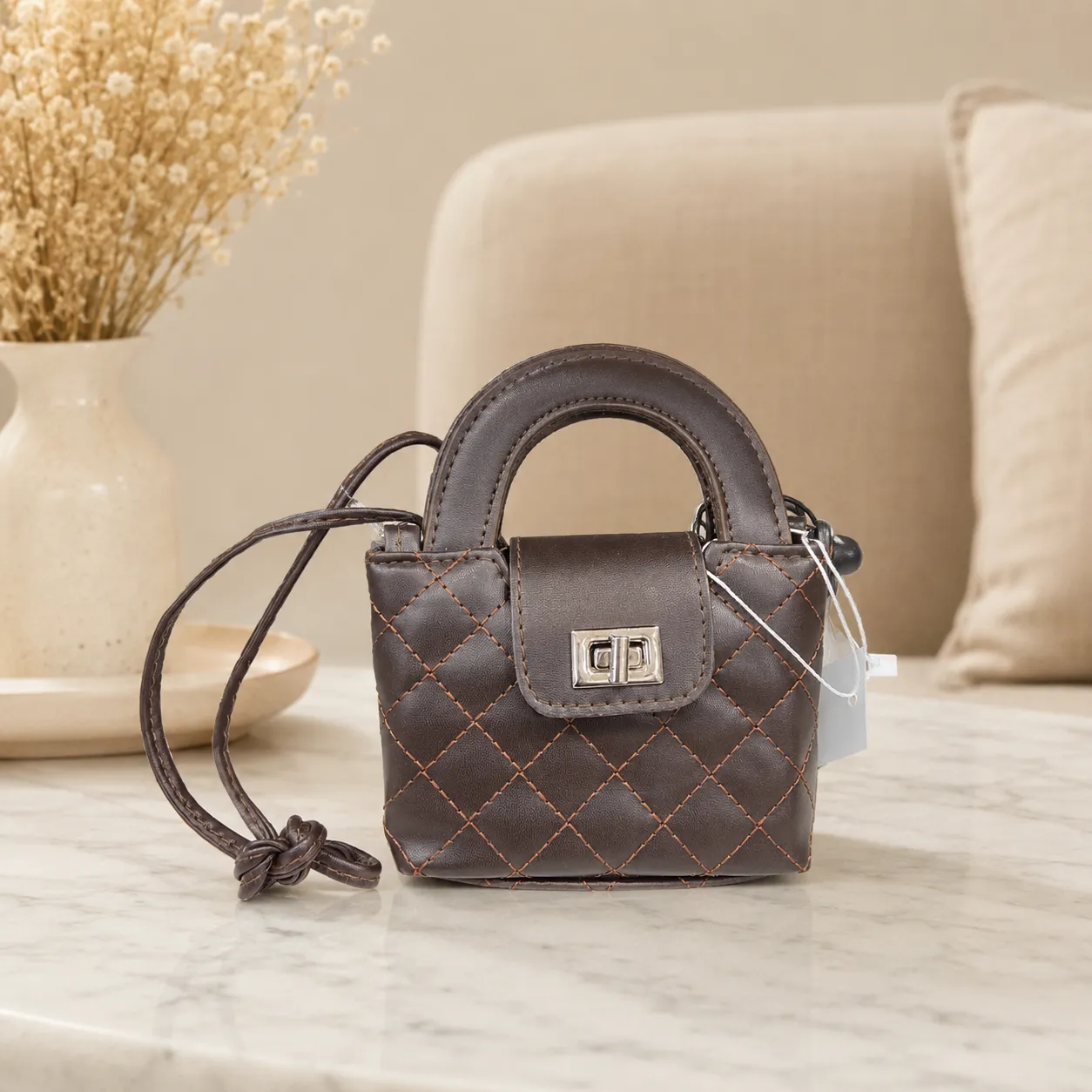 yasmin-womens-quilted-mini-handbag مینیبگ دستی زنانه یاسمین لوزیدوزی با قفل چرخشی - Image 1